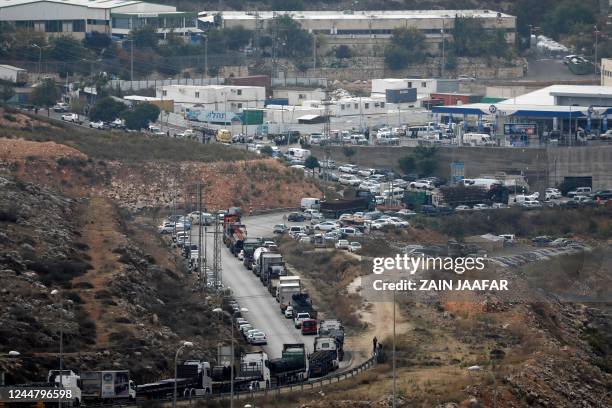 Picture taken from Palestinian village of Salfit shows traffic around the area where an attack took place in the Ariel settlement Industrial Zone in...