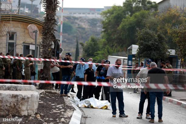 Israeli forces inspect the area after two Israelis were killed and four others injured in a stabbing attack in the illegal Jewish settlement of...
