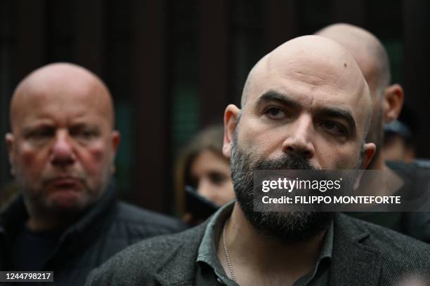 Italian writer Roberto Saviano addresses the media as he leaves on November 15, 2022 the City of Justice in Rome, following a hearing in a defamation...