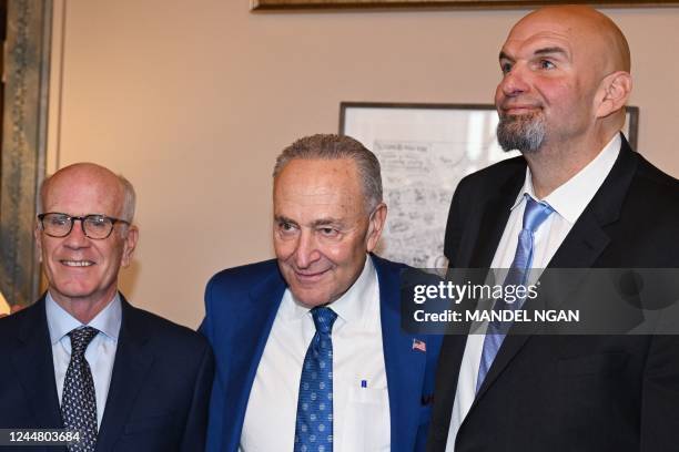 Senate Majority Leader Chuck Schumer, Democrat of New York, meets with Democratic senators-elect John Fetterman , of Pennsylvania, and Peter Welch ,...