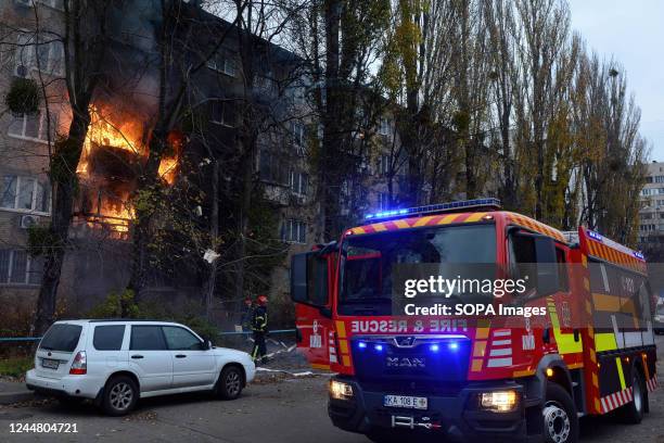 Fire rescue truck is seen at the residential building hit by a Russian missile strike, amid Russia's attack on Ukraine, in Kyiv.