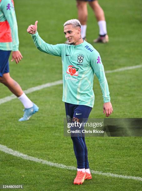 Antony of Brazil greets the fans during the Brazil Training Session at Juventus Training Center on November 15, 2022 in Turin, Italy.