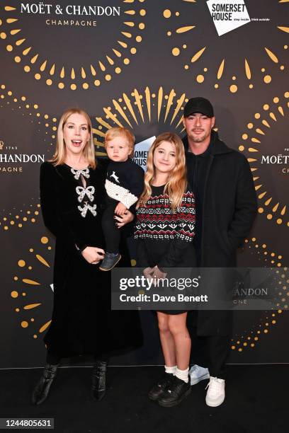 Katherine Ryan and Bobby Kootstra pose with children Fred and Violet at Skate at Somerset House with Moët & Chandon at Somerset House on November 15,...