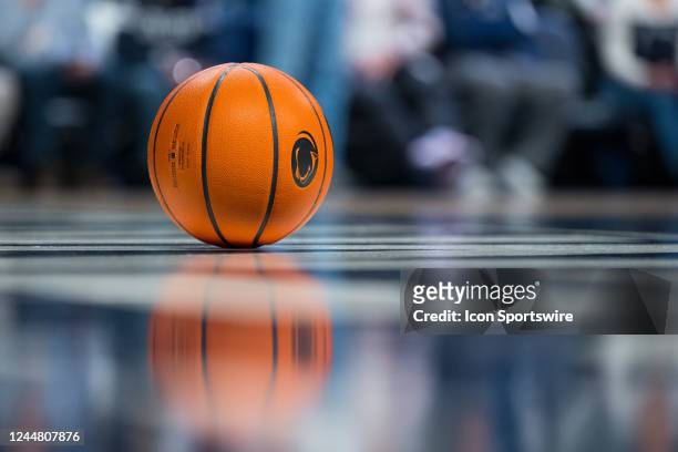 Basketball with the Penn State Nittany Lions logo on the floor during the Gavitt Tipoff men's college basketball game between the Butler Bulldogs and...