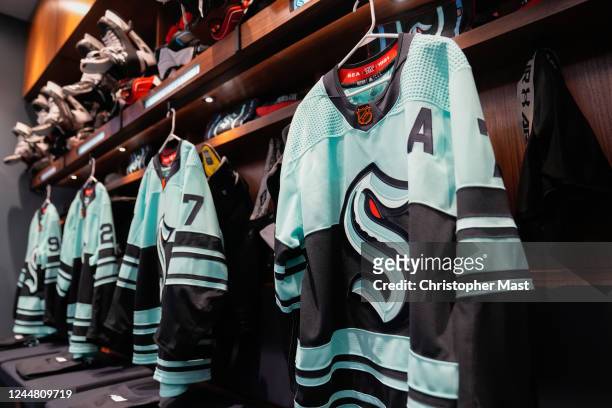 The reverse retro jersey of Jordan Eberle of the Seattle Kraken hangs in the locker room prior to a game against the Winnipeg Jets at Climate Pledge...
