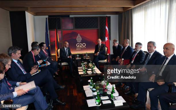 Turkish President Recep Tayyip Erdogan meets with German Chancellor Olaf Scholz as part of the 17th G20 leaders' Summit in Bali's southern peninsula...