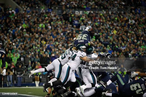 Seattle Seahawks running back Mike Davis is stopped short of the goal line by Philadelphia Eagles outside linebacker Najee Goode , Philadelphia...