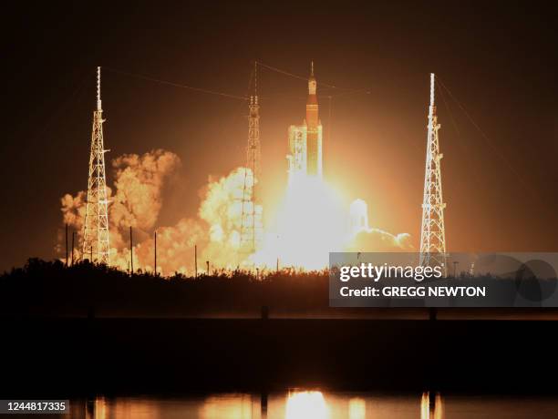 The Artemis I unmanned lunar rocket lifts off from launch pad 39B at NASA's Kennedy Space Center in Cape Canaveral, Florida, on November 16, 2022. -...