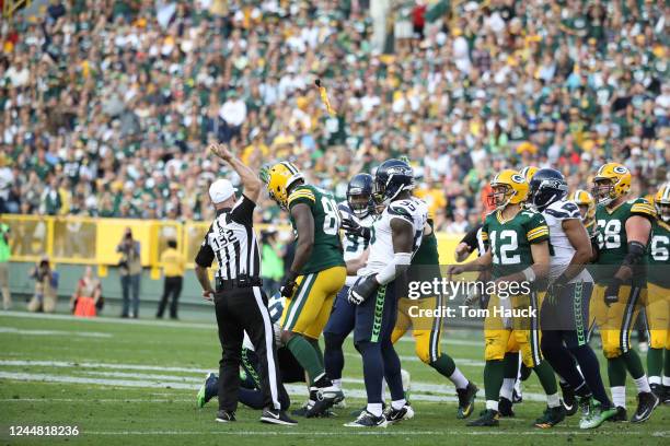 Green Bay Packers tight end Martellus Bennett hits Seattle Seahawks outside linebacker K.J. Wright during an NFL game between the Green Bay Packers...