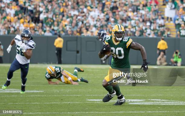 Green Bay Packers tight end Martellus Bennett runs with the ball during an NFL game between the Green Bay Packers and the Seattle Seahawks Sunday,...