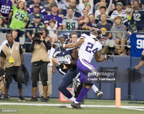 Seattle Seahawks wide receiver Kasen Williams drops a pass as covered by Minnesota Vikings cornerback Jabari Price during an NFL preseason game...