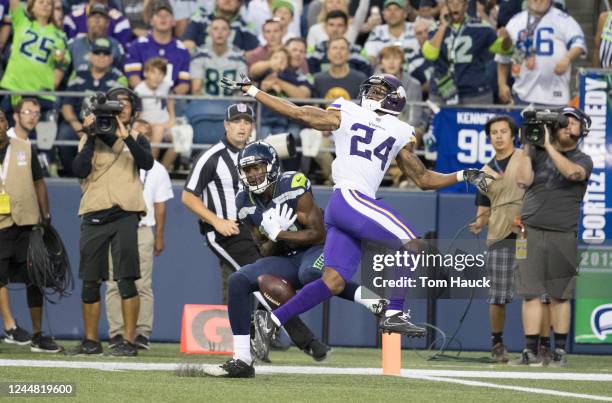 Seattle Seahawks wide receiver Kasen Williams drops a pass as covered by Minnesota Vikings cornerback Jabari Price during an NFL preseason game...