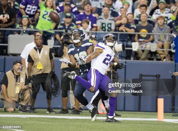 Seattle Seahawks wide receiver Kasen Williams drops a pass as covered by Minnesota Vikings cornerback Jabari Price during an NFL preseason game...