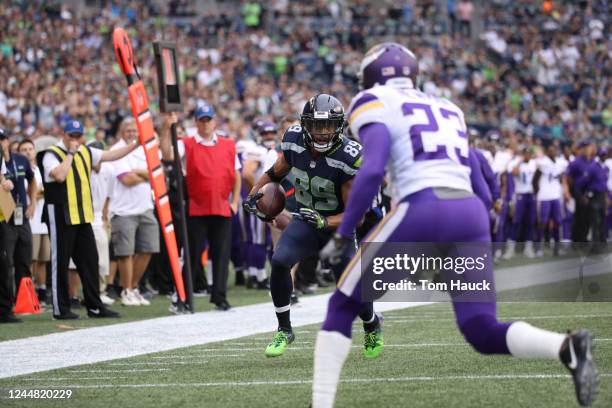 Seattle Seahawks wide receiver Doug Baldwin is hit at the goal line by Minnesota Vikings cornerback Terence Newman and fumbles the ball during an NFL...