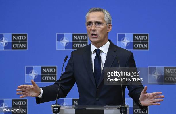 Secretary General Jens Stoltenberg gestures as he addresses media after a meeting of the North Atlantic Council, following yesterday's explosion in...