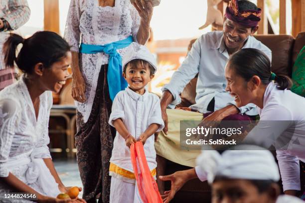 living their best life - balinese headdress stock pictures, royalty-free photos & images
