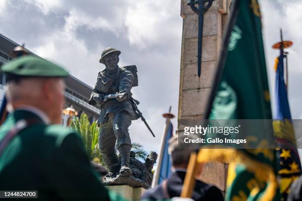 Veterans organisation hold their flags at the annual Remembrance Day memorial service and wreath-laying parade at the Cenotaph War Memorial Statue in...