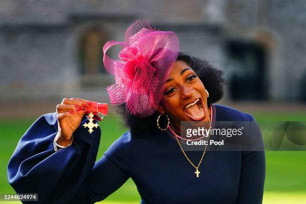Kadeena Cox after being made an Officer of the Order of the British Empire for services to athletics and cycling by King Charles III during an...