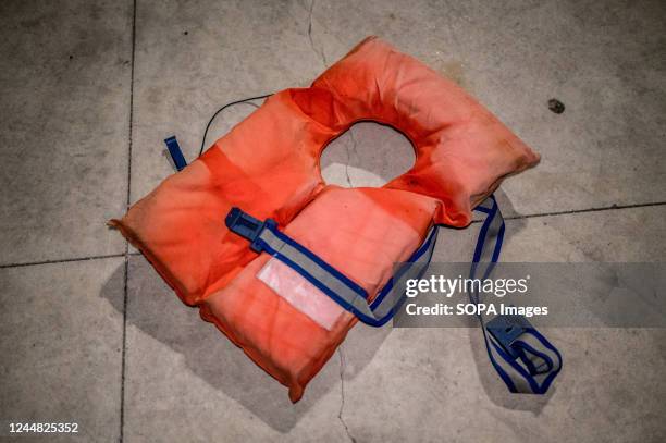 Life jacket is left lying on the ground following the arrival of migrants in Roccella Jonica. 28 migrants, mainly from Bangladesh, have been rescued...