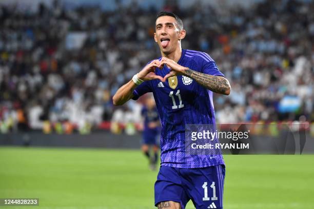 Argentina's midfielder Angel Di Maria celebrates after scoring during the friendly football match between Argentina and the United Arab Emirates at...