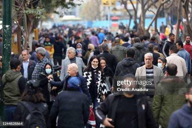 People are seen on a street in Tehran, Iran on November 16, 2022.