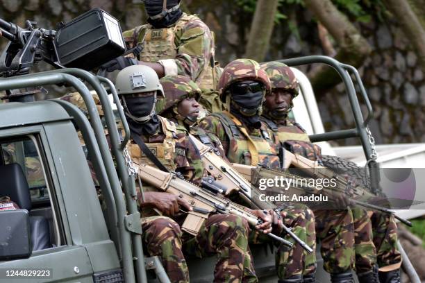 Military troops are seen after a military plane, carrying Military troops sent by Kenya to the eastern Democratic Republic of the Congo to prevent...