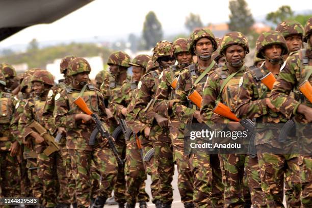 Military troops are seen after a military plane, carrying Military troops sent by Kenya to the eastern Democratic Republic of the Congo to prevent...