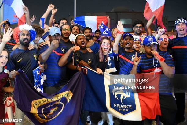 France's supporters react in front of their team hotel in Doha on November 16 ahead of the Qatar 2022 World Cup football tournament.