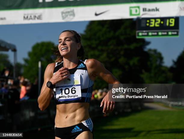 August 6: Emily Durgin, one of the elite runners with ties to Maine crosses the finish line at the Beach to Beacon 10K Saturday, August 6, 2022.