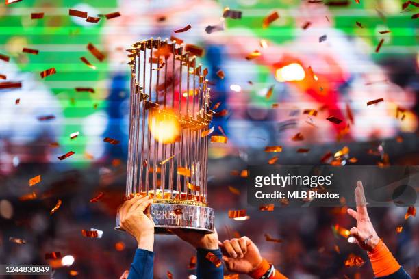 Members of the Houston Astros hoist up the Commissioners Trophy after the Astros defeated the Philadelphia Phillies in Game 6 of the 2022 World...
