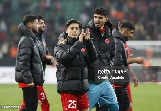 Arda Guler and the goalkeeper Altay Bayindir of Turkiye greet fans at the end of the friendly match between Turkiye and Scotland in Diyarbakir,...