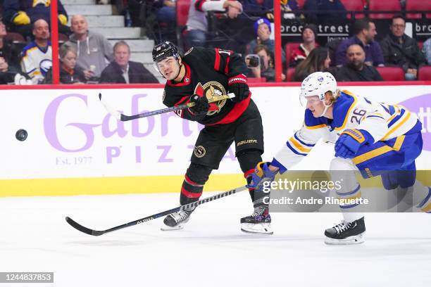 Alex DeBrincat of the Ottawa Senators shoots the puck against the Buffalo Sabres at Canadian Tire Centre on November 16, 2022 in Ottawa, Ontario,...