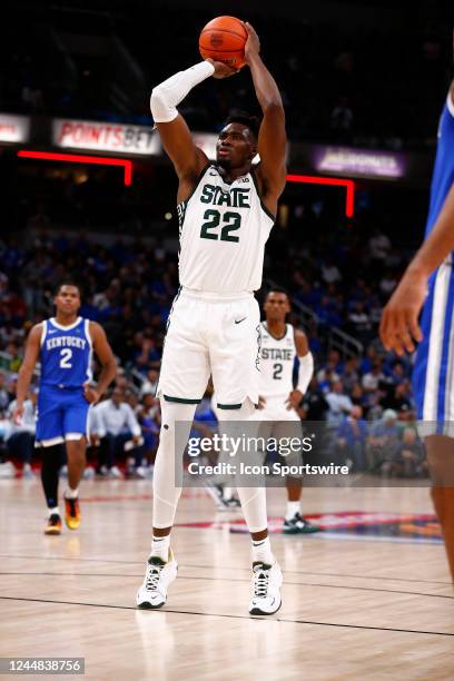 Michigan State Spartans center Mady Sissoko shoots his free throw in over time during the men's Champions Classic college basketball game between the...