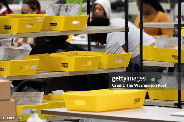 Ballots in boxes at the Philadelphia ballot processing center, in Philadelphia, Pennsylvania, on November 8, 2022.