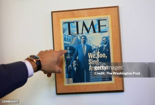 David C. Banks, the chancellor of the New York City public schools, points to a TIME magazine cover of he and his family displayed in his office at...