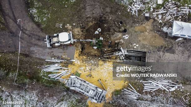 Aerial view taken on November 17, 2022 shows the site where a missile strike killed two men in the eastern Poland village of Przewodow, near the...