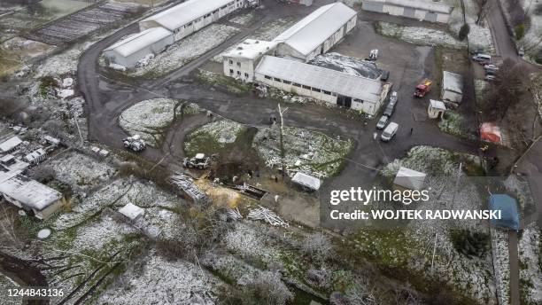 Aerial view taken on November 17, 2022 shows the site where a missile strike killed two men in the eastern Poland village of Przewodow, near the...