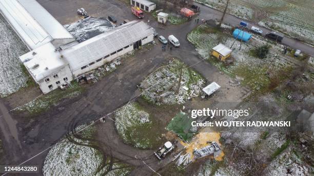 Aerial view taken on November 17, 2022 shows the site where a missile strike killed two men in the eastern Poland village of Przewodow, near the...