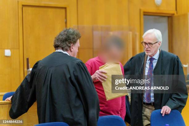 The defendant and alleged author of "NSU 2.0" threatening letters talks to his lawyer ahead of the continuation of his trial in Frankfurt am Main,...