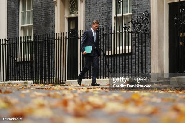 Chancellor of the Exchequer Jeremy Hunt departs Downing Street to present the Autumn Statement to the House of Commons on November 17, 2022 in...