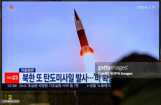 Screen shows a file image of North Korea's missile launch during a news program at the Yongsan Railway Station in Seoul. North Korea fired one...
