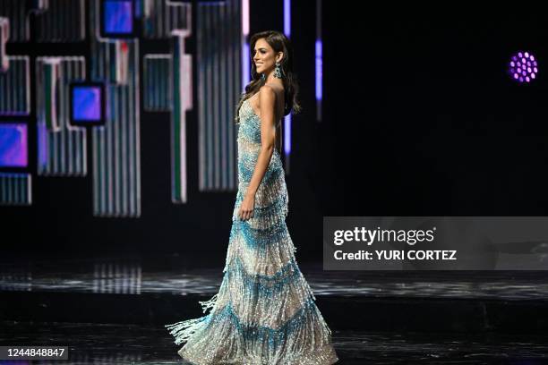 The new Miss Venezuela Diana Silva, representative of the Capital District, parades in a gala dress at the Poliedro de Caracas on November 16, 2022.