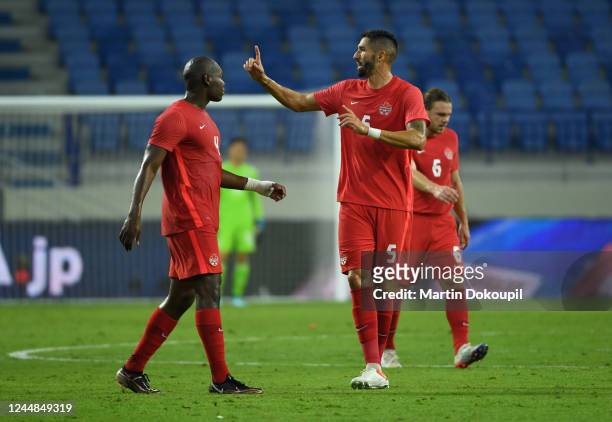 Steven Vitoria of Canada celebrates scoring a 1-1 equalizer after a corner kick during the international friendly between Japan and Canada at...