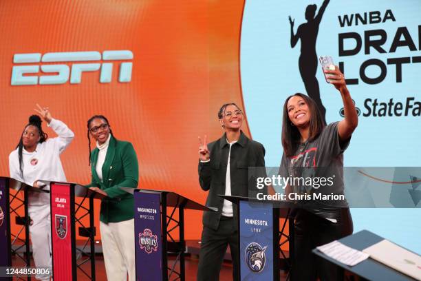 Napheesa Collier of the Minnesota Lynx takes a selfie with Natasha Cloud, Tanisha Wright and Kelsey Mitchell during the 2023 WNBA Draft Lottery on...