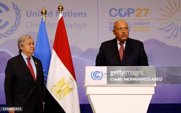 Egypt's Foreign Minister Sameh Shukri speaks as United Nations Secretary General Antonio Guterres listens, at a press conference during the COP27...