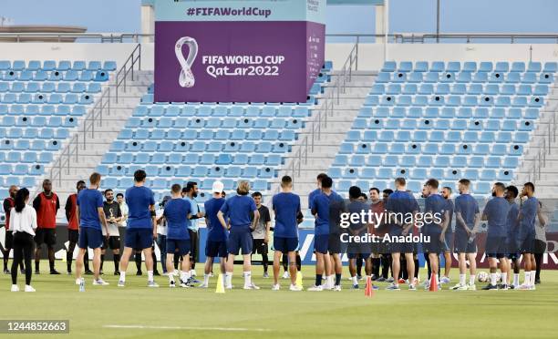 Group of workers and their families working in the construction of the stadiums that will host the World Cup, together with the football players of...