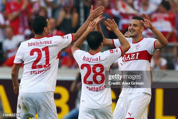 Zdravko Kuzmanovic of Stuttgart celebrates his team's second goal with team mates Tamas Hajnal and Khalid Boulahrouz during the Bundesliga match...