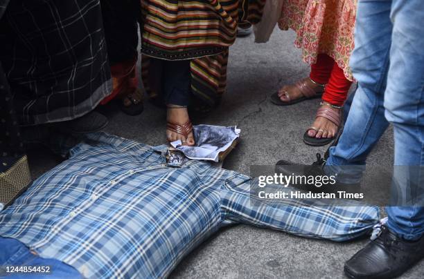 Leader Ram Kadam along with party workers hold placards and photos of deceased Shraddha Walker, shout slogans during a protest against her boyfriend...