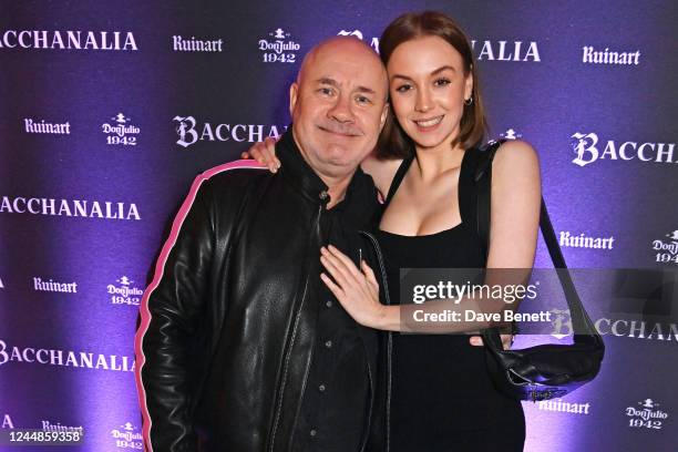 Damien Hirst and Sophie Amber attend Bacchanalia London's grand opening party on November 17, 2022 in London, England.