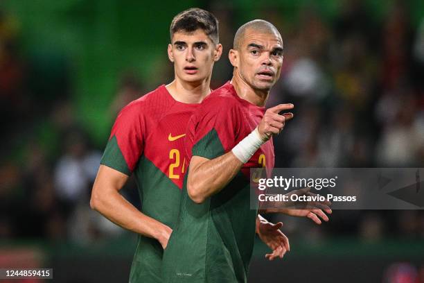 Antonio Silva and Pepe of Portugal in action during the friendly match between Portugal and Nigeria at Estadio Jose Alvalade on November 17, 2022 in...